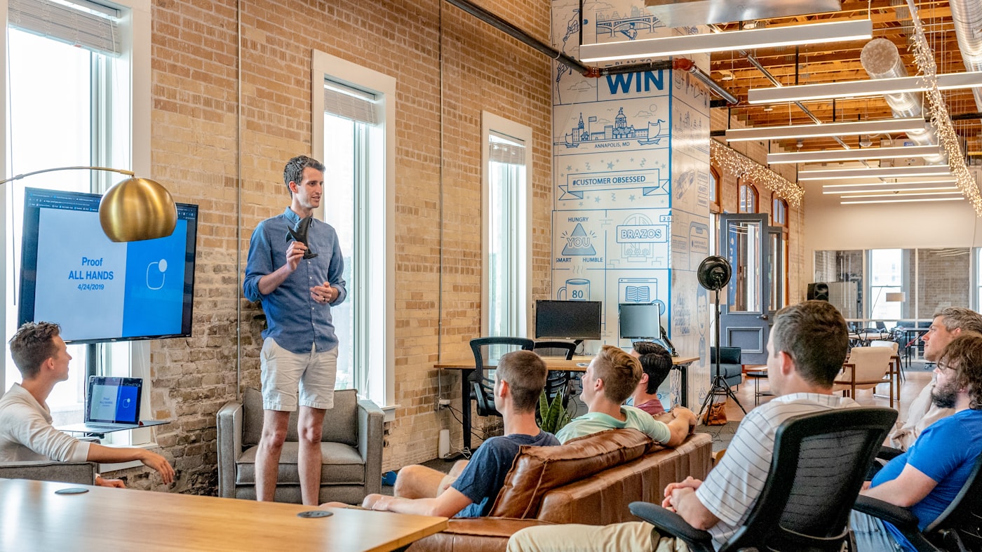 Team at a fintech company reviewing dashboards